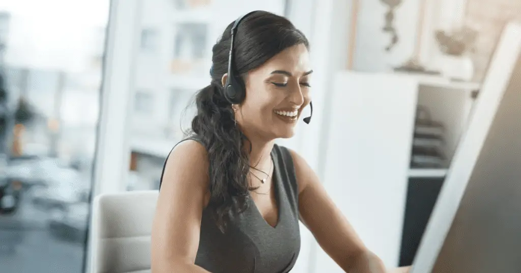 A lady doing customer service on the phone