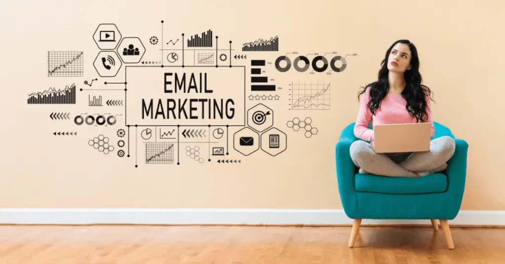 A woman sitting in a chair in front of a wall with the word email marketing.