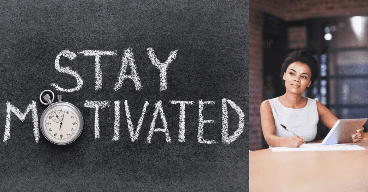 A woman exemplifying how to stay motivated in business at her desk with the words "stay motivated" written on it.
